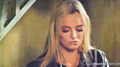 Blonde woman in leather jacket pouting seductively, large booty lesbian masturbation scene