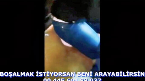 Busty woman exposing huge natural tits in blurry phone sex ad with Turkish cum call invite