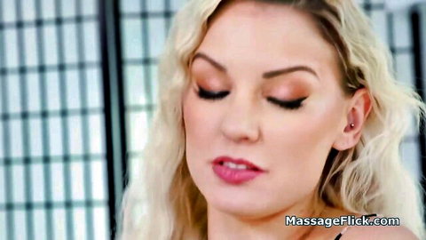 Seductive blonde with tongue out teasing blowjob in massage parlor