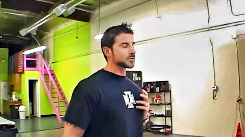 Eva Angelina scene with muscular stud holding drink in gym
