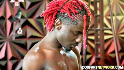 Muscular black jock with red dreads shirtless in steamy pose
