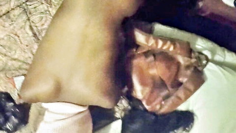 Blurry close-up of woman's pale thigh in white stockings, hinting at tight snatch intimacy