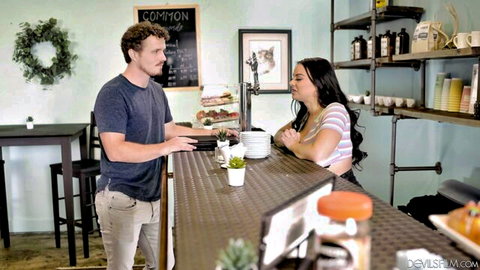 Payton Preslee in striped top flirting at counter with barista