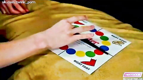Gay twinks hands tangled on Twister mat in young neighbor handjob scene