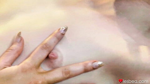 Blonde lesbian hand spreading wet pussy in intimate play