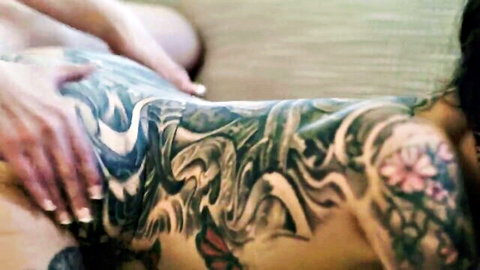 Arabelle Raphael tattooed back erotic massage nude