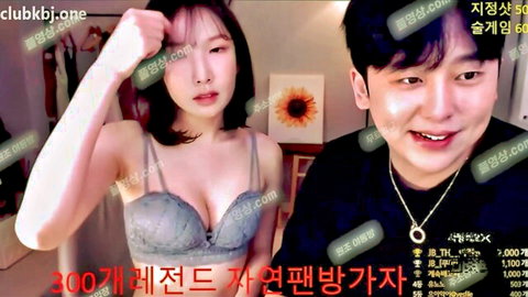 Petite Korean babe in lacy bra teases deep cleavage posing playfully with smiling boyfriend