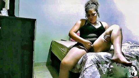 Curvy Latina BBW with huge tits spreads legs fingering wet shaved pussy on bed