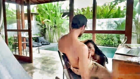 Thai woman sucking bald black man's cock poolside in tropical villa