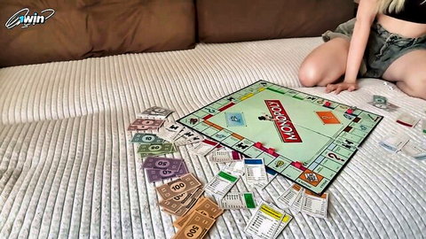 Arisha Mills blonde stepsister in strip Monopoly game setup