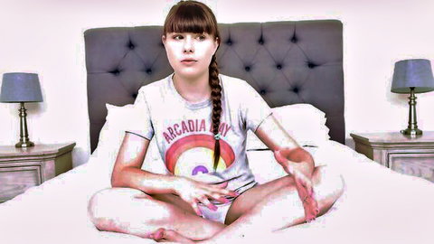 Brunette in Arcadia Bay t-shirt and pink panties sits cross-legged on bed for Chad White interview