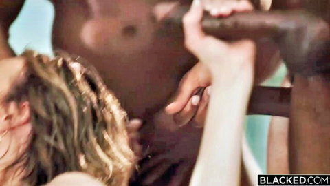 Serenity Cox gripping big black cock in intense gangbang scene