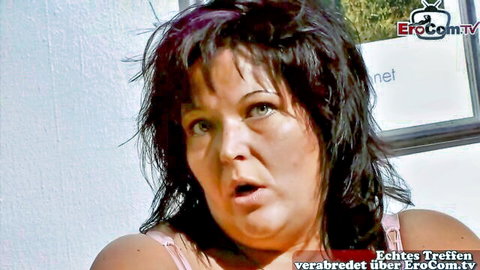 Curvy brunette with wet hair in surprised expression at adult casting audition