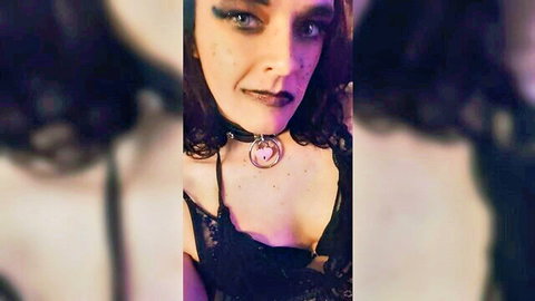 Alternative goth trans woman with freckles in black lace lingerie and collar
