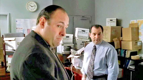 Two suited men in office scene from The Sopranos S02E11 with Jennifer Albano