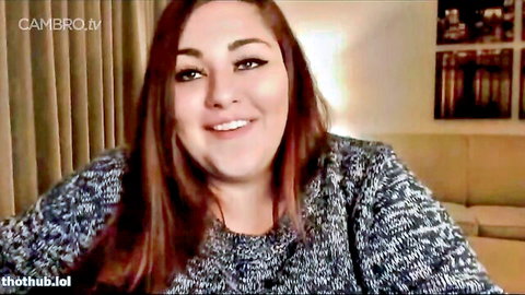 Destiny Diaz redhead smiling in sweater, curvy Latina storytime