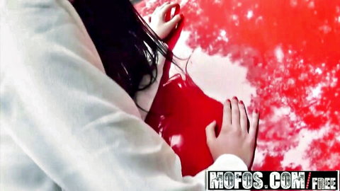 Leyla Peachbloom, European teen in white top, hands on red car hood