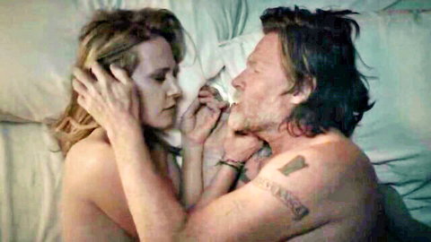 Amy Hargreaves nude intimate embrace with lover in bed, bare tits visible