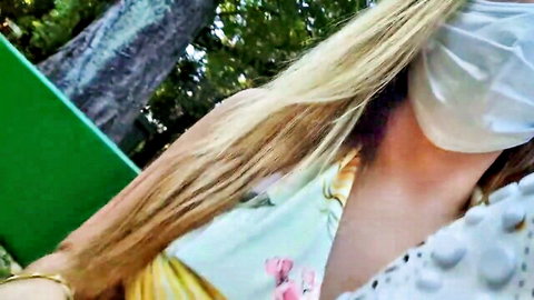 Mimi Boliviana in floral dress at park, busty blonde OnlyFans tease