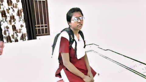 Innocent Indian Bengali schoolgirl in red skirt uniform, glasses, backpack