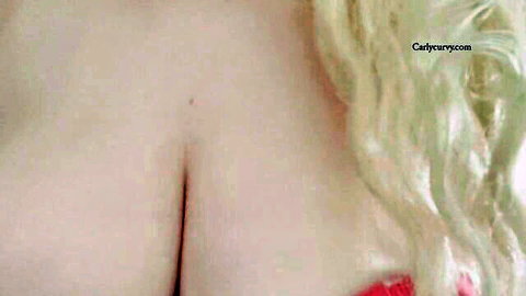 Blonde babe in red top with deep cleavage gives JOI in short petticoat
