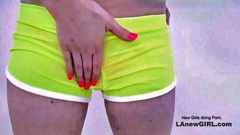 Cute Aria teases tight pussy in green shorts with hand