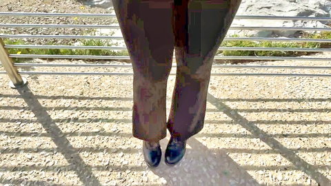 Lily, 23yo Parisian in brown flared pants and black heels outdoors