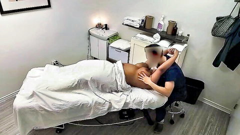 Ebony babe with huge bare ass getting sensual massage on buttocks by female masseuse