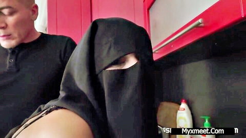 Veiled Muslim MILF in lingerie teases with man in naughty kitchen scene