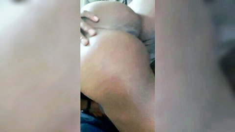 Thick ebony ass cheeks gripped hard by black hand closeup view