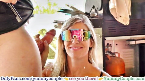 Blonde MILF smiling in sunglasses with cock near face in amateur cumshot