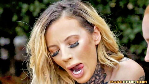 Inked Barbie tattooed blonde in outdoor group oral action