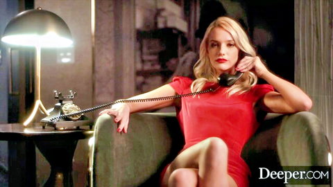 Seductive blonde babe in tight red dress talking on retro phone, teasing her legs and curves