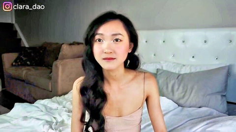 Clara Dao Asian YouTuber in thin strap top on bed