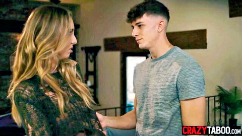 Blonde MILF in sheer lace top grabs young stud's arm intimately