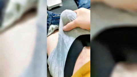 Amateur guy in jeans pulls gray underwear aside exposing erect cock and hairy pubes
