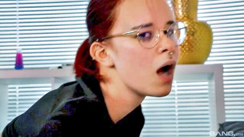 Redhead teen Davina in glasses surprised during sofa bang