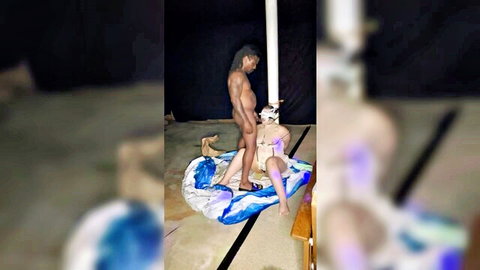 Interracial drowning fetish: Black stud stands over naked white woman on inflatable float