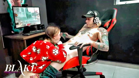 Amateur gamer girl in pajamas rides tattooed guy during sex
