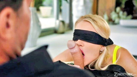 Blindfolded blonde deepthroats thick cock as man grips her head firmly
