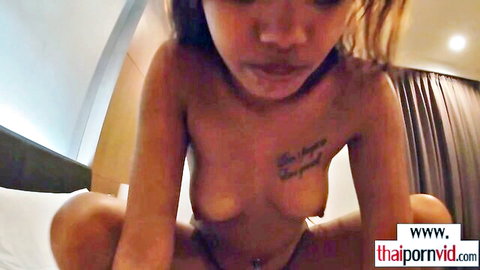 Petite Thai teen amateur squatting topless exposing shaved pussy
