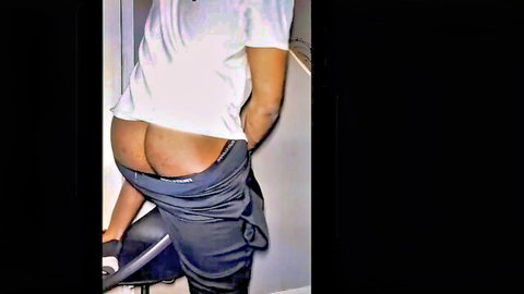 Muscular hunk pulling down gray pants to expose firm ass in solo tease