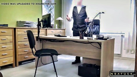 Stranger in vest standing in office for cash sex encounter