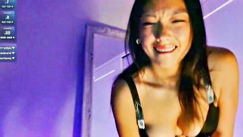 Vivian Winters smiling with cleavage in black top on Chaturbate live