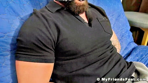 Bearded muscular man in polo shirt presents soles for worship, Tommy Tucker foot fetish