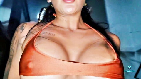 Mariana Martix in sheer orange top, teasing big breasts at Colombian party