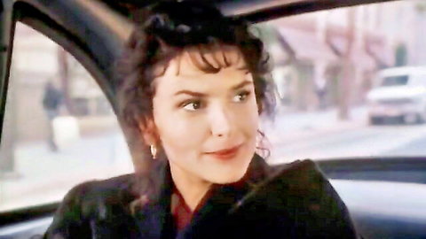 Roma Downey in car interior scene from Getting Up and Going Home (1992)