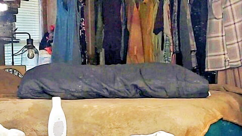 Shimmer11111 posing with masculine bum in front of mirror