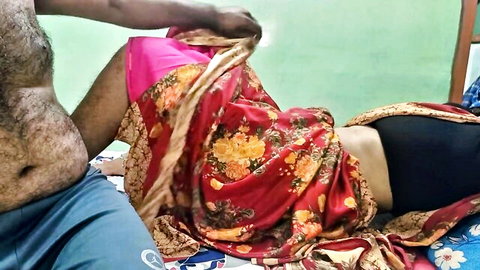 Hairy Indian husband lifts wife's red floral saree exposing pink panties on bed