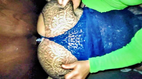 Big tattooed ass spread wide by hands with blue lace thong aside exposing butt plug in anus